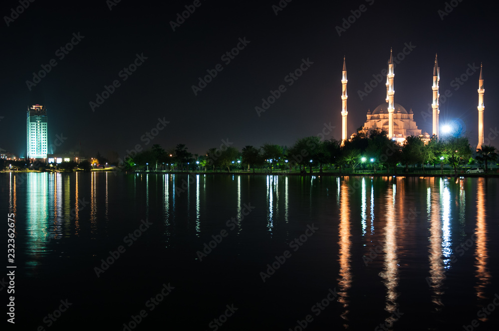 Fototapeta premium The view mosque and reflection at night, city background.