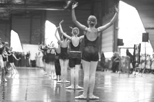 A group of ballet dancers at the rehearsal of the performance in the large hall
