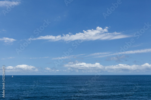 perfect sky, sailing boat and water of ocean