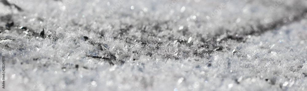 fluffy flakes of the first snow laying on the ground fluffy flakes of the first snow laying on the ground