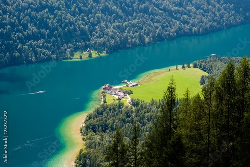 View of the lake Konigsee and the pilgrimage church Sankt Bartholoma from the Rinkendelsteig, Berchtesgaden Alps, Schonau am Konigsee, Berchtesgaden National Park, Berchtesgadener Land, Bavaria, Germany, Europe photo