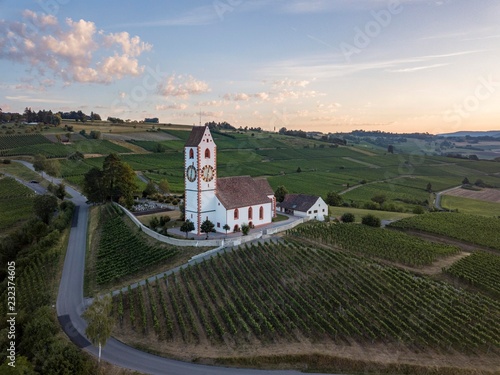 Mountain church St. Moritz at dawn, aerial view, Hallau, Schaffhausen, Switzerland, Europe photo