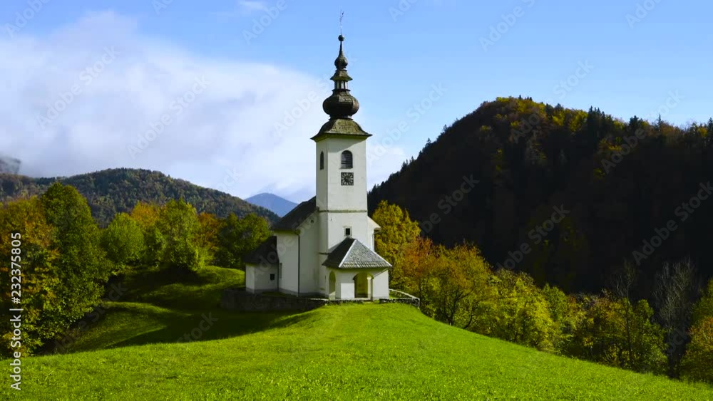 Sv. Marko chapel in Lower Danje, Slovenia at autumn colors,time lapse Sv. Marko chapel in Lower Danje, Slovenia at autumn colors,time lapse