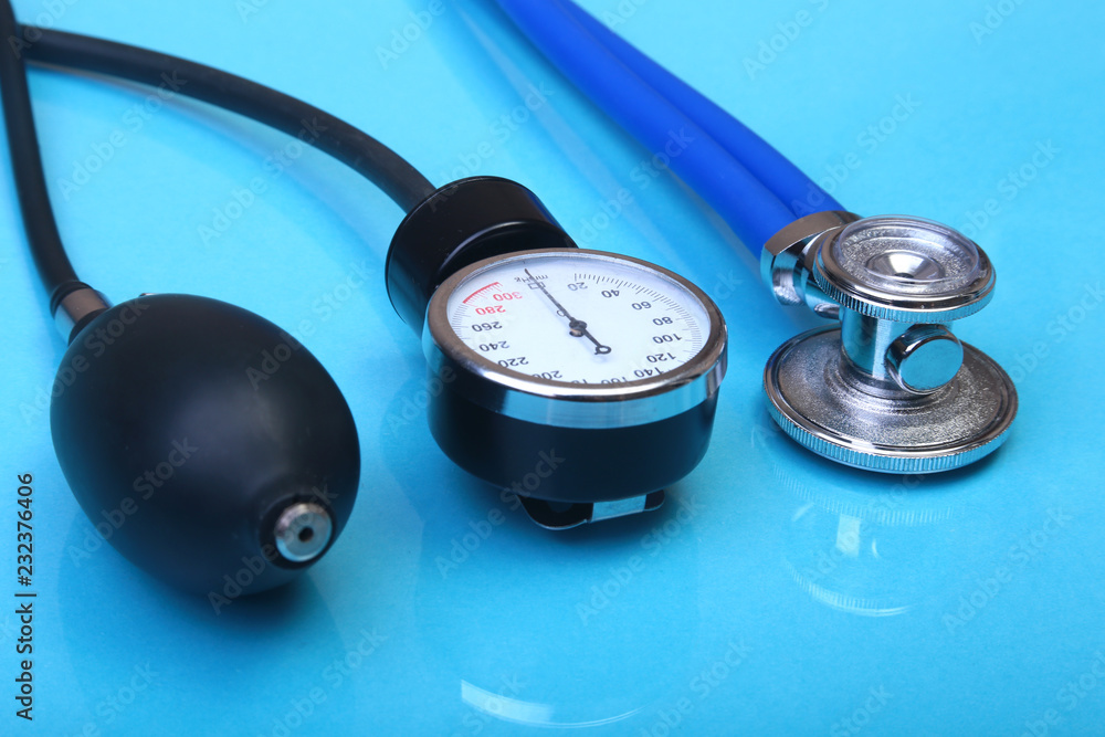 Medical stethoscope and blood pressure meter isolated on white background. healthcare. Medical stethoscope and blood pressure meter isolated on white background. healthcare.