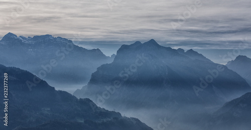 mountains and clouds in switzerland