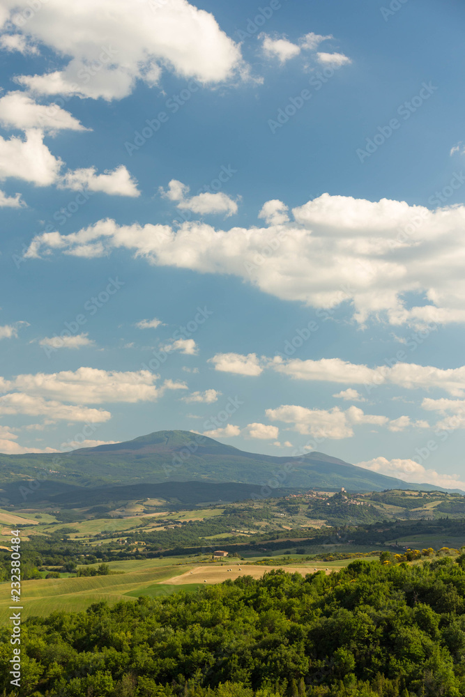 Shallow hills and green meaddows during midday in the Tuscany Shallow hills and green meaddows during midday in the Tuscany