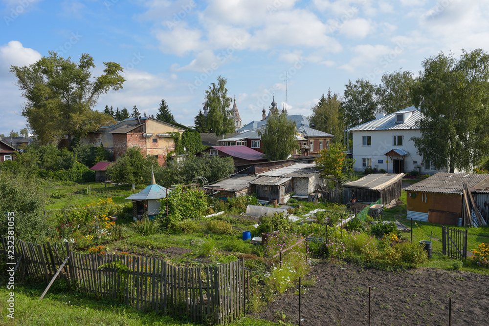 Yuriev-Polskiy city, gardens and houses on the background of the monastery