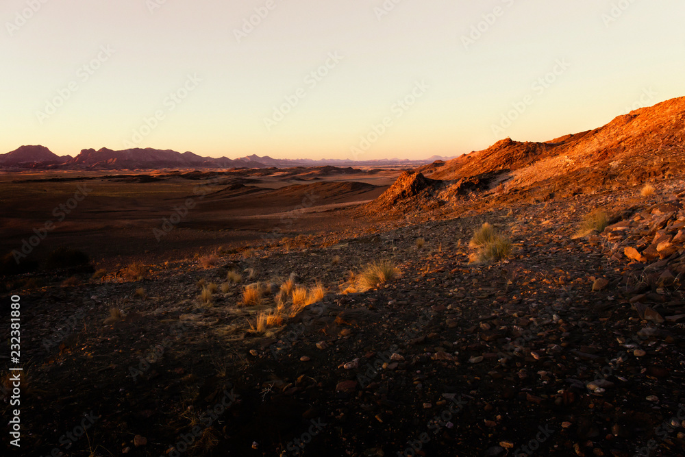 Sunset landscape of the Namib-Naukluft National Park is a national park of Namibia encompassing part of the Namib Desert (considered the world's oldest desert) and the Naukluft mountain range