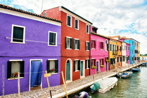 Beautiful street with multicolored houses, Burano island, Venice, Italy