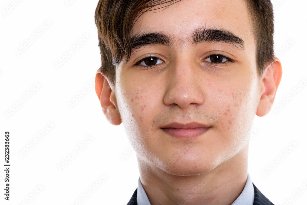 Fototapeta premium Close up of young handsome Persian teenage businessman
