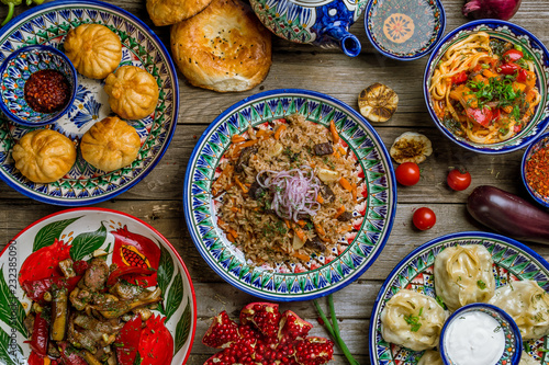 dishes of Uzbek cuisine lagman, pilaf, manti photo
