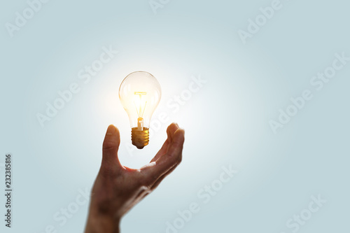 Glass bulb in hands