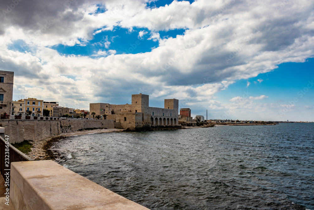 View of the Swabian castle of Trani. Stone fortress, on the sea. In Puglia, near Bari, Barletta, Andria.