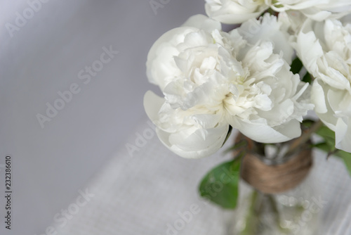 Bouquet of White Peony Flowers in Glass and Twine Vase © Karen