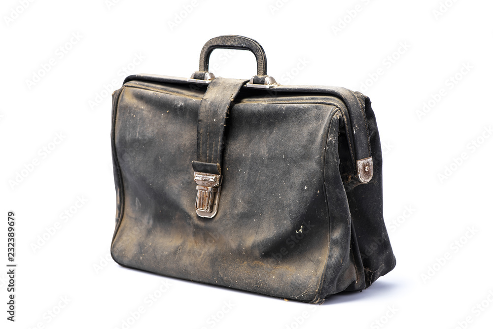 Retro business briefcase covered with dust, black leather flapover, isolated on white background with shadow, angle view Retro business briefcase covered with dust, black leather flapover, isolated on white background with shadow, angle view