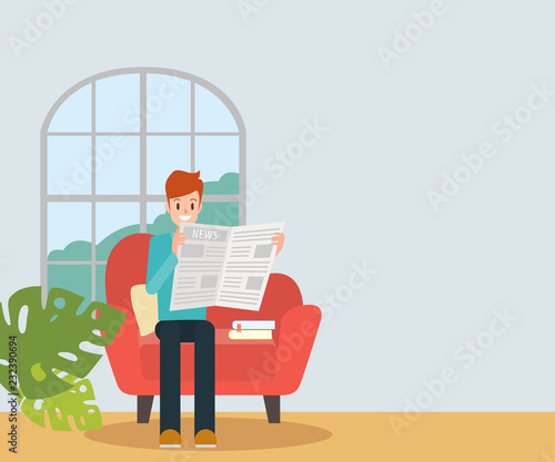 Young man reading a news paper on the sofa in the room. People lifestyle character.