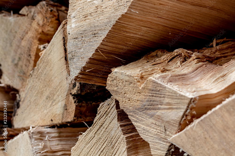 Stacked firewood waiting to be burned.