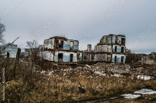 Old destroyed an abandoned multi-storey building in a military t © Максим Хасанов