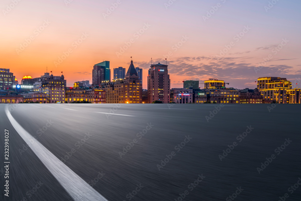 City skyscrapers and road asphalt pavement City skyscrapers and road asphalt pavement