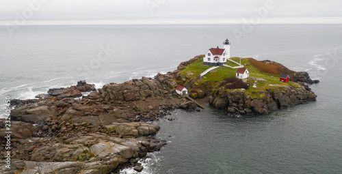 Cape Neddick Lighthouse Nubble Island Rock in York Maine photo