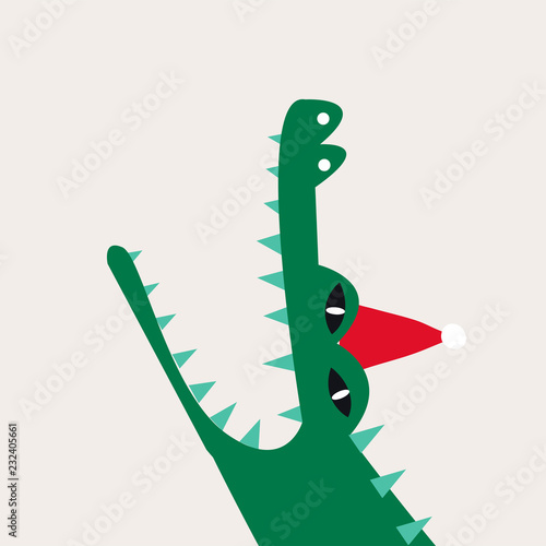 Aquatic cartoon crocodile wearing a Christmas hat vector