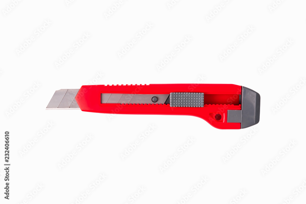 Red cutter knife isolated on white background. Red cutter knife isolated on white background.