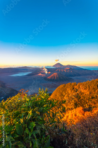 View of mountain Bromo at East Java Indonesia from the peak during sunrise