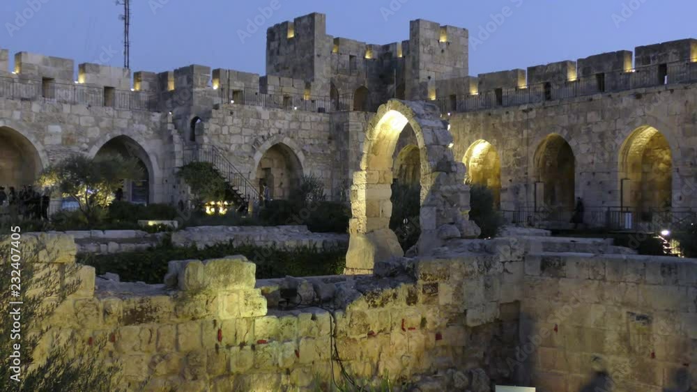 David tower, or Tower of David in old city Jerusalem, near Jaffa gate during sunset with blue and gold colors David tower, or Tower of David in old city Jerusalem, near Jaffa gate during sunset with blue and gold colors