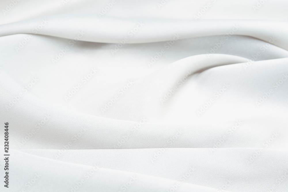 The texture of the satin fabric of blue color for the background The texture of the satin fabric of blue color for the background
