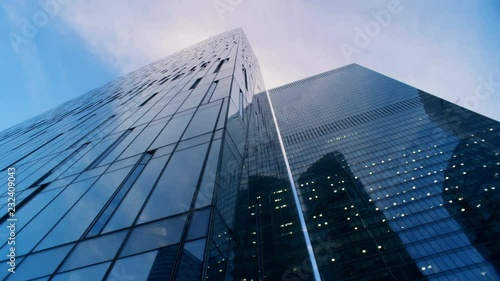 Reflective glassy walls of several skyscrapers. 6K Cinema camera footage. photo