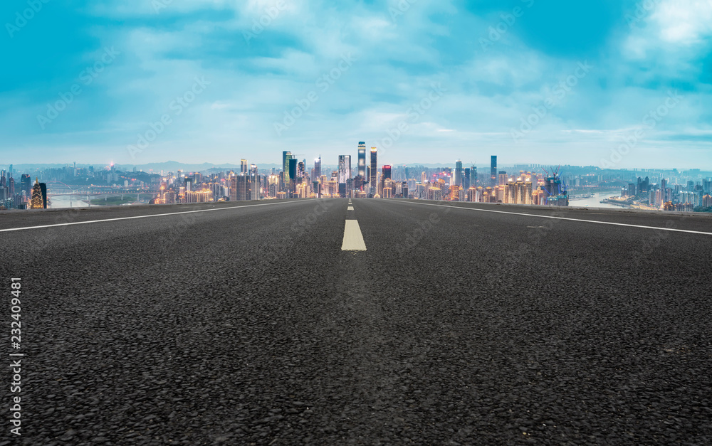 City skyscrapers and road asphalt pavement City skyscrapers and road asphalt pavement