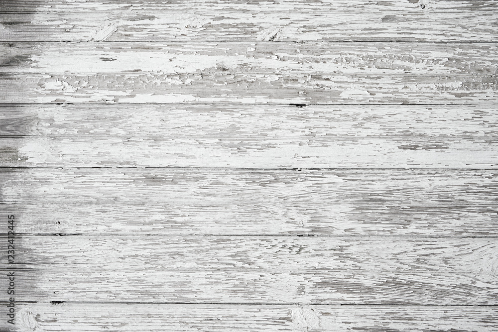 Old weathered wood surface with long boards lined up. Wooden planks on a wall or floor with grain and texture. Light neutral flat faded tones. Old weathered wood surface with long boards lined up. Wooden planks on a wall or floor with grain and texture. Light neutral flat faded tones.