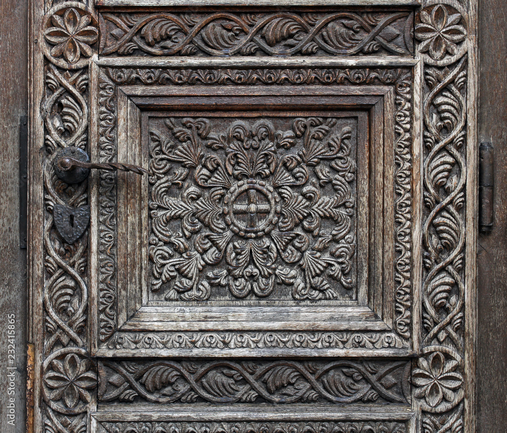 Wooden motifs on a medieval church door