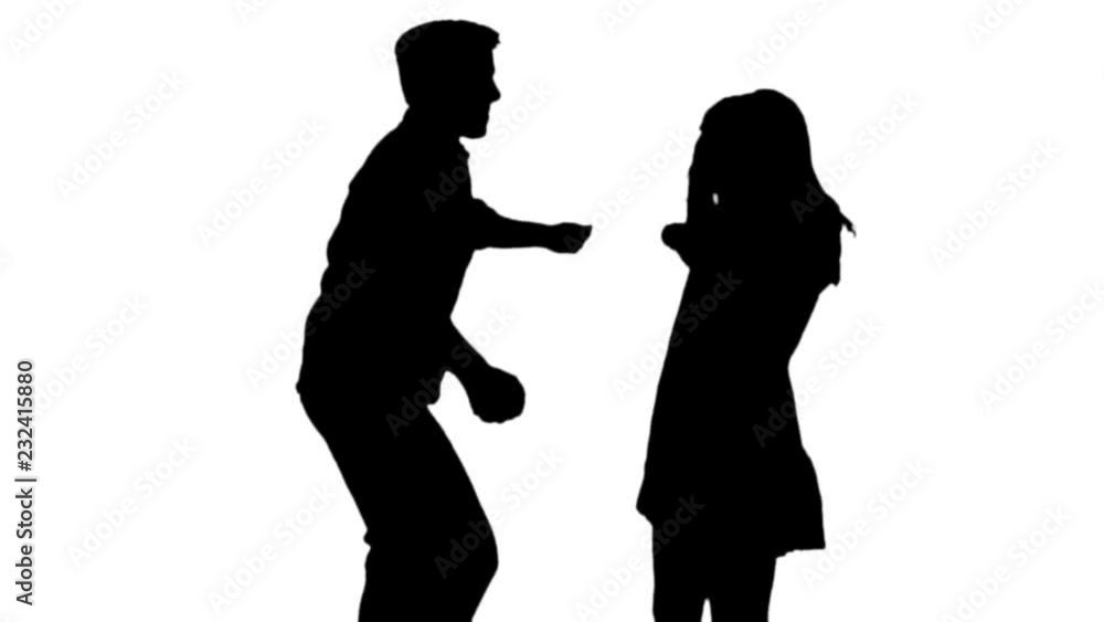 Slow motion silhouette of a couple, danceing happily . Slow motion silhouette of a couple, danceing happily .