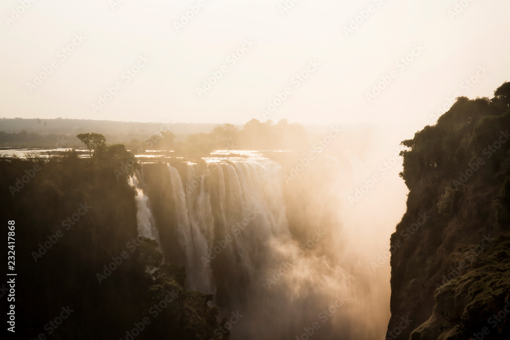 famous Victoria Falls on the Zambezi River in South Africa. At the end of the rainy season, the waterfall most high water