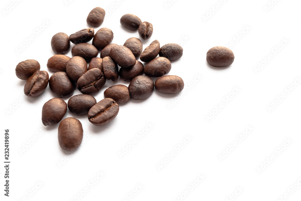 Roasted coffee beans on white background. Roasted coffee beans on white background.