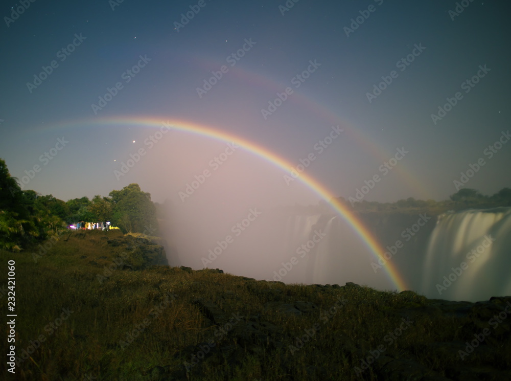 Victoria Falls,Zimbabwe-August 17, 2016: A lunar rainbow or a moonbow on the Victoria Falls observed within 2 days of full moon.
Victoria Falls,Zimbabwe-August 17, 2016: A lunar rainbow or a moonbow on the Victoria Falls observed within 2 days of full moon.
