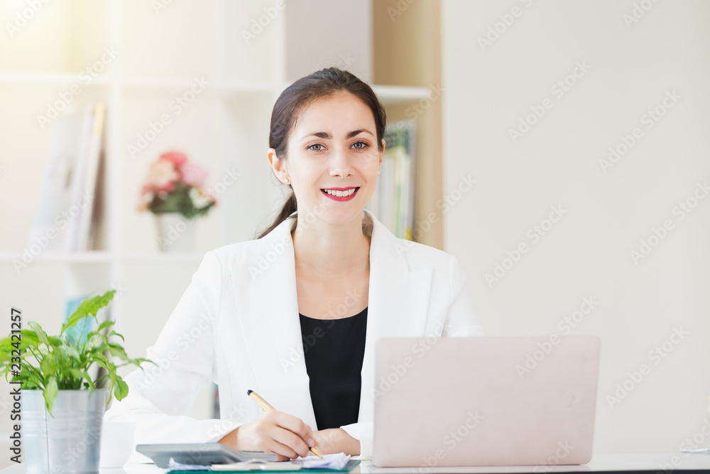 Portrait business women smiling working in office Portrait business women smiling working in office