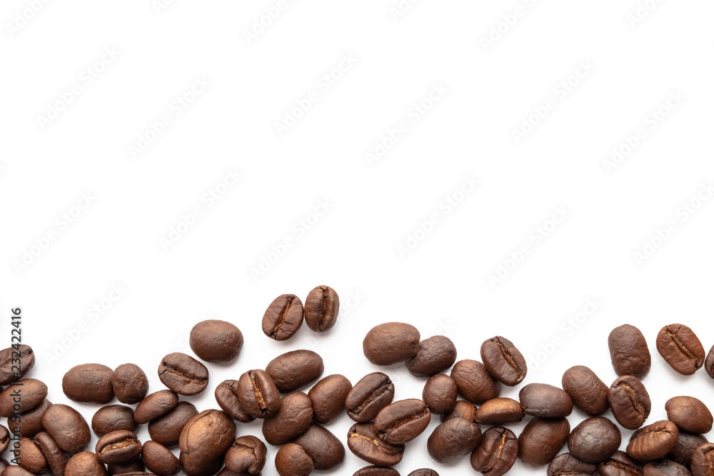 Roasted coffee beans for background with copy space area for text. Roasted coffee beans for background with copy space area for text.