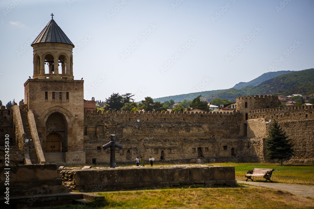 Typical Georgian architecture of ancient temples made of light stone. Fortresses and temples of Georgia in Mtskheta