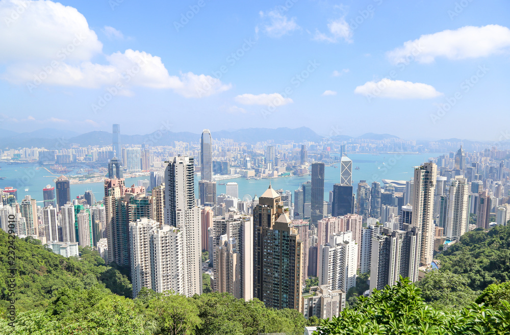 Beautiful view of HongKong skyline in the day of bright and clear blue sky