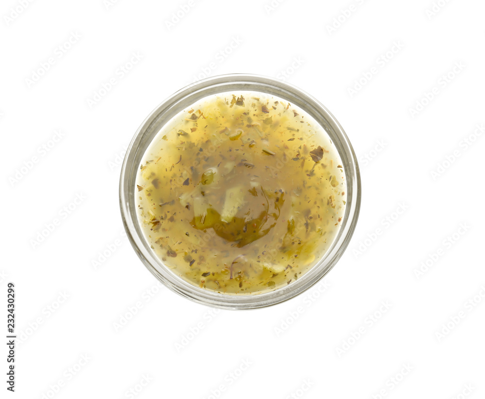 Tasty green sauce in bowl on white background Tasty green sauce in bowl on white background