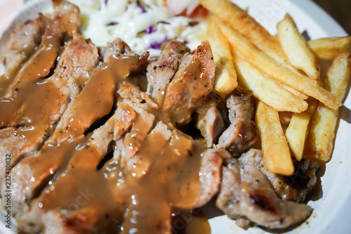 Steak and french fried food street by foodtruck, Bangkok, Thailand.