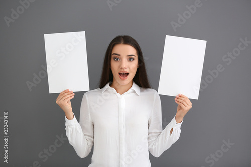 Emotional young woman with ...