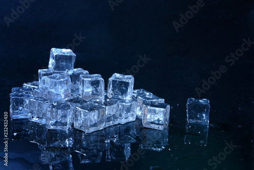 Ice cubes on dark background