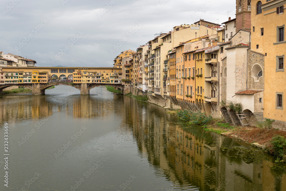 FLORENCE, ITALY - OCTOBER 28, 2018: Beautiful view of the Ponte Vecchio bridge across the Arno River