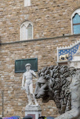 FLORENCE, ITALY - OCTOBER 28, 2018: The Medici lions are a pair of marble sculptures of lions, one of which is Roman, dating to the 2nd century AD