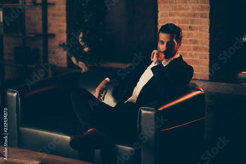 Tableau sur toile Attractive groomed masculine oligarch stubble man in elegant for