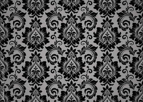 Wallpaper in the style of Baroque. Seamless vector background. Black and grey floral ornament. Graphic pattern for fabric, wallpaper, packaging. Ornate Damask flower ornament