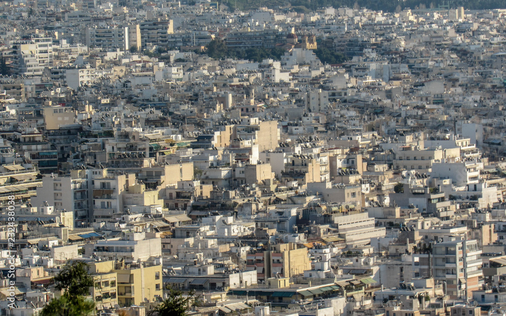 View of Athens city from Mount Lycabettus showing white buildings architecture, Greece